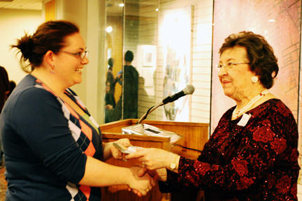 Jerry presenting a CD to the winner of one of the drawings